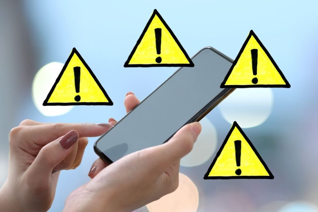 Cellulare e triangolo di pericolo